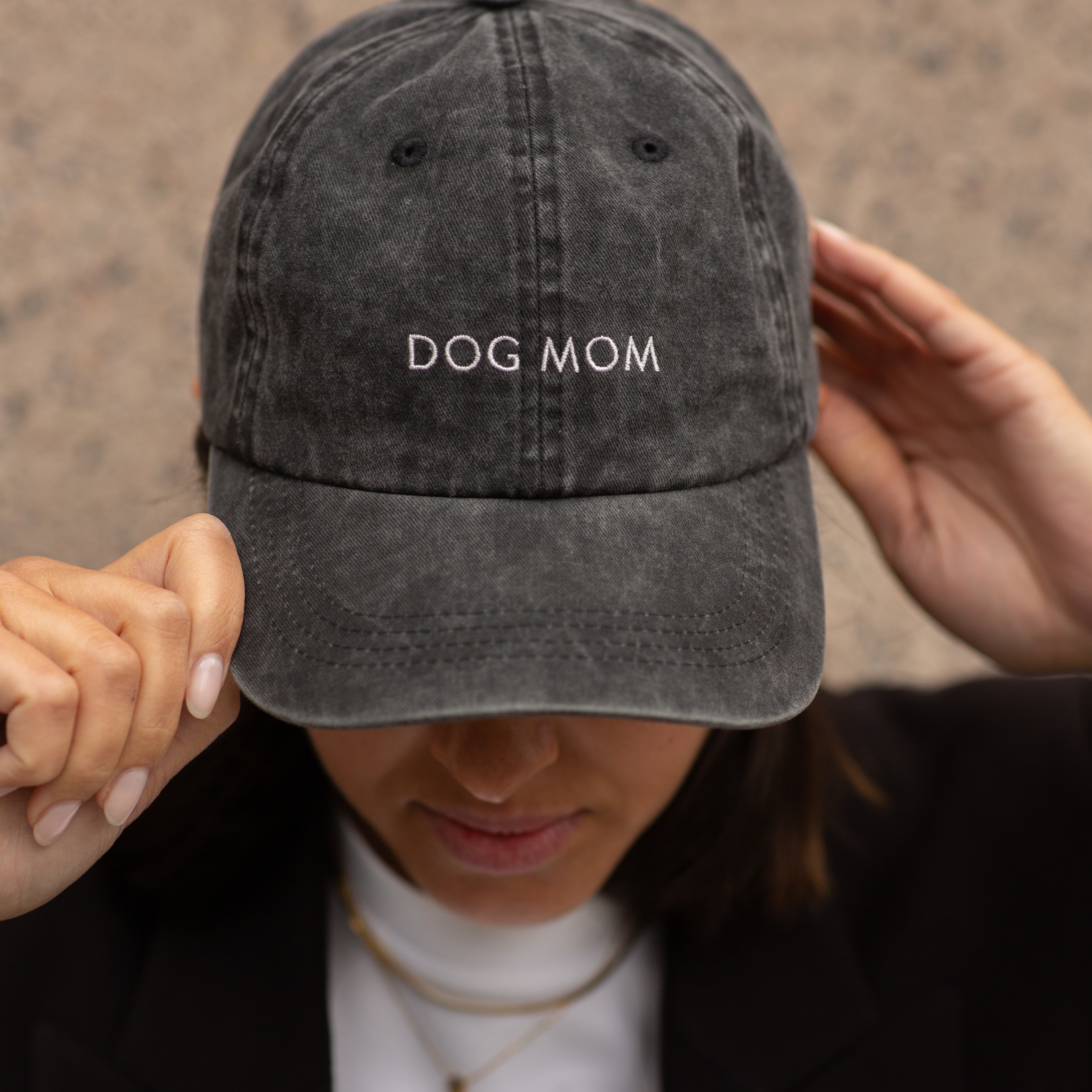 black-denim-cap-dog-mom-wearing-woman.jpg